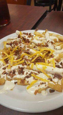 Fries with Smothered Queso & Bacon APPETIZER 